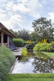 Country Style Garden By De Rooy Hoveniers Country Homify Water Features In The Garden Backyard Water Feature Garden Design