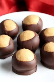 Buckeyes Also Known As Peanut Butter Balls Have A Smooth Peanut Butter Center And A Fun Chocolate Shel Desserts Buckeye Recipe Easy Cookies Recipes Christmas