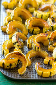 This Delicata Squash Recipe Is Roasted With Brown Sugar Maple Syrup And Cinnamon F Delicata Squash Recipe Winter Squash Recipes Delicata Squash Recipe Roasted