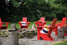 Thom Filicia S Waterfront Retreat Domino Red Adirondack Chairs Adirondack Stump Table