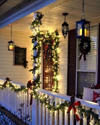 Evergreen Garlands With Lights And Red Bows Front Porch Christmas Decor Outdoor Christmas Lights Porch Christmas Lights