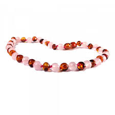 Tous mes 4 petits enfants ont porté un collier d'ambre acheté en boutique bio. Collier Pour Bebe En Ambre Caramel Et Quartz Rose