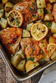 Roasted Lemon Chicken Thighs With Potatoes Recipe Lemon Chicken Thighs Chicken Recipes Recipes