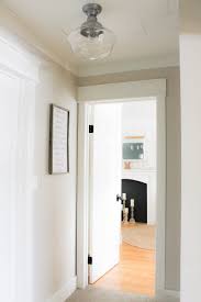A Farmhouse Style Hallway Makeover Making It In The Mountains Farmhouse Light Fixtures Hallway Light Fixtures Farmhouse Dining Room