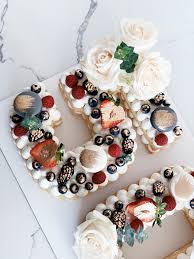 50 Cookie Cake Number Cake With Flowers Macaroons And Fresh Fruits Flower Cake Cookie Cake Fruit Cake Cookies