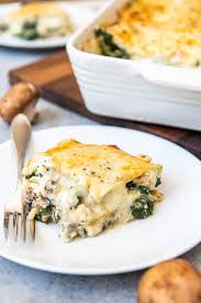 An Image Of A Slice Of Chicken Spinach Lasagna Made With A White Sauce Cheese And Mushroom Chicken Spinach Lasagna White Sauce Recipes Chicken Lasagna Recipe