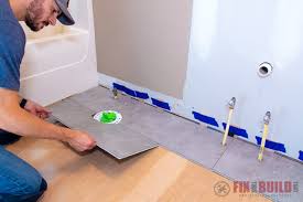 I am going to lay some new lino in my bathroom. How To Install Vinyl Plank Flooring In A Bathroom Fixthisbuildthat