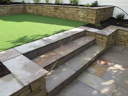 Split Level Low Maintenance Garden Scheme With Natural Sandstone Patios And Raised Planters Www Ow Backyard Landscaping Backyard Low Maintenance Garden Design