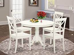To tie everything together, display a few palm leaves in a vase on the. Amazon Com East West Furniture 5 Pc Dining Set Included A Round Dining Room Table And 4 Dining Chairs Solid Wood Kitchen Chairs Seat X Back Linen White Finish Furniture Decor