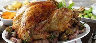 The english christmas traditional dinner is the roast turkey with vegetables and sauces. Anatomy Of A British Christmas Dinner Anglophenia Bbc America