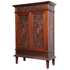 Antique Javanese Teakwood Cabinet With Detailed Carvings Early 20th Century Painting Wooden Furniture Antique Furniture Living Room Art Furniture