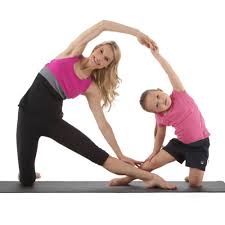 9 Yoga Poses You Can Do With Your Kids Kids Yoga Poses Partner Yoga Poses Yoga For Kids