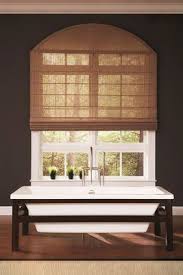 Add Texture To Your Home With Natural Woven Romanshades Arched Window Coverings Arched Window Treatments Curtains For Arched Windows