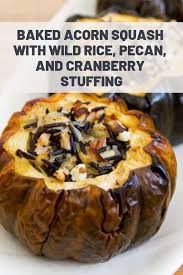 Baked Acorn Squash With Wild Rice Pecan And Cranberry Stuffing Recipe Recipe Acorn Squash Acorn Squash Recipes Acorn Squash Baked