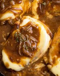 Incredibly tender & super juicy pork chops coated in a sticky honey garlic sauce and baked to a delicious perfection. French Onion Smothered Pork Chops Recipetin Eats