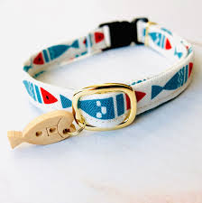 This is a braided ribbon cat collar, encasing a traditional nylon webbing base. Kitty Fish Print Collar Free Bell Etsy Kitten Collars Cat Collars Fish Print