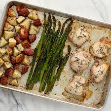 One Sheet Rosemary Chicken Thighs Veggies 680x680 Chicken Thights Recipes Potato And Asparagus Recipe Asparagus Recipes Oven