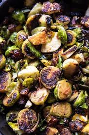 Pan Roasted Brussels Sprouts With Bacon Dates And Halloumi Half Baked Harvest Recipe Half Baked Harvest Recipes Brussel Sprouts Roasted Brussel Sprouts