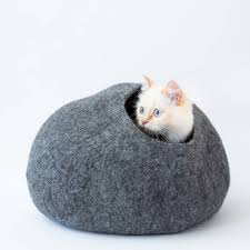 Our cat house is also versatile. Cat Cave Co Luxury Felted Wool Hand Made Cat Beds