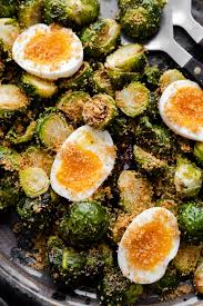 Oven Roasted Brussels Sprouts With Jammy Eggs Naturally Recipe Brussel Sprouts Roasted Brussel Sprouts Side Dishes