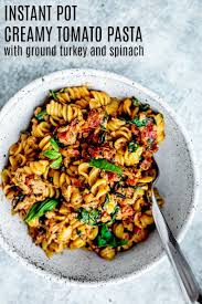 Instant Pot Creamy Tomato Pasta With Ground Turkey Spinach Recipe Ground Turkey Pasta Instant Pot Pasta Recipe Creamy Tomato Pasta