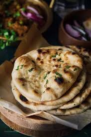 No Yeast Whole Wheat Garlic Naan Without Tandoor Oven No Yeast Eggless Still Crispy Soft Fluffy Naan Like Re Recipes Indian Flat Bread Indian Food Recipes