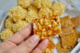 Jaggery Peanut Chikki Desi Peanut Brittle Roasted Peanuts Coated By Caramelized Jaggery To Make Perfect Peanut Brittle Food Processor Recipes Crispy Treats