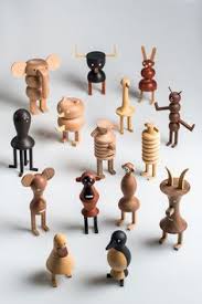 A Cheerful Crew Of Wooden Creatures Wooden Animals Wood Toys Wooden Sculpture