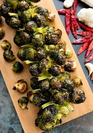 Roasted Spicy Garlic Brussels Sprouts On The Stalk Recipe Brussel Sprout Recipes Roasted Sprout Recipes Cooking Brussel Sprouts