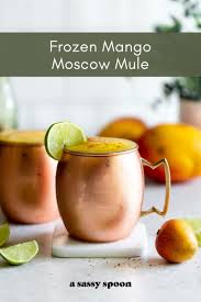 Frozen Mango Moscow Mule A Delicious Mango Twist To The Traditional Moscow Mule Made With Spicy Ginger Beer Frozen Man In 2020 Mule Recipe Moscow Mule Recipe Recipes