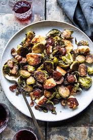 Pan Roasted Brussels Sprouts With Bacon Dates And Halloumi Half Baked Harvest Recipe Friendsgiving Food Half Baked Harvest Recipes Sprout Recipes