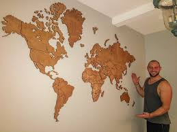 Step By Step How To Make A Wooden World Map For Your Wall Wall Maps Wooden Map Diy Wall Art