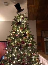 Winter Wonder Lane Black Snowman Hat Tree Topper Big Lots We added a couple of floral picks to the tree to appear as snowman arms and it all comes together perfectly.