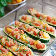 Bruschetta Hummus Stuffed Zucchini Recipe Yummly Recipe Zucchini Recipes Healthy Zucchini Boat Recipes Squash Recipes