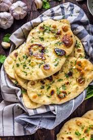Homemade Garlic Naan Host The Toast Recipe Garlic Naan Recipe Indian Food Recipes Recipes