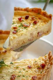 Classic Quiche Lorraine With A Savory Egg Custard Bacon And Cheese Filling In Flaky Pie Crust Quic Quiche Lorraine Recipe Quiche Recipes Easy Brunch Recipes