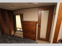 Used 2012 Heartland Bighorn 3070rl Fifth Wheel At Optimum Rv Ocala Fl 1kz959a Bed With Slide Fifth Wheel Tv In Bedroom