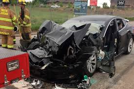 A Traffic Collision Is Seen Involving A Tesla Model S Sedan With A Fire Department Mechanic Truck Stopped At A Red Light In South Jordan Utah On Friday South Jordan Police Department