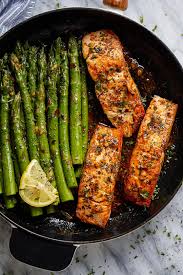 Garlic Butter Salmon With Lemon Asparagus Skillet Health Dinner Recipes Salmon Dishes Butter Salmon