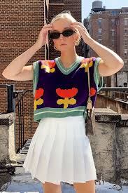 The Knit Vest Trend That S Taking Over This Fall Who What Wear Some jumper dress styles may provide enough coverage worn alone in warmer weather. the knit vest trend that s taking over