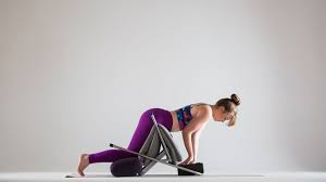 Mayurasana Made Easier Use A Chair To Fly In Peacock Pose Peacock Pose Poses Yoga Help