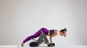 Mayurasana Made Easier Use A Chair To Fly In Peacock Pose In 2020 Peacock Pose Poses Ball Exercises