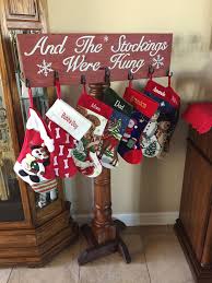 Diy Christmas Stocking Stand From An Old Porch Column And Scrap Barn Wood Christmas Stockings Diy Christmas Crafts Christmas Decor Diy
