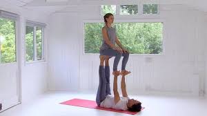 The Fifth In Our Acro Yoga Series Yoga For Two People Pip And Eugene Begin To Demonstrate How To Link Pos Couples Yoga Poses Partner Yoga Poses Couples Yoga
