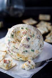 This Cheese Ball As A Perfect Blend Of Flavors Including Ranch Crispy Baco 2 Kinds Of Cheese And Chives A Perf Cheese Ball Recipes Food Cheddar Cheese Ball