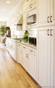 Beautiful And Bright Luxury Kitchen With Light Wood Floors Antique White Kitchen Wood Floor Kitchen Modern Kitchen Flooring