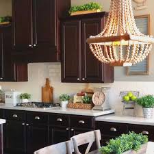to decorate above your kitchen cabinets