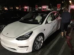 Tesla model 3 is expected to be launched in india by 2021. Tesla Model 3 With White Interior Option Spotted Ahead Of Fall Availability