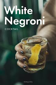 The White Negroni Is A Tasty Light And Mild Version Of The Strong Classic Cocktail It Is Bright Crisp Classic Cocktails Cocktail Recipes Easy Negroni Recipe