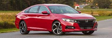 Detailed features and specs for the 2020 honda accord including fuel economy, transmission, warranty, engine type, cylinders, drivetrain and more. 2020 Honda Accord Sport 2l Red Parked On Asphalt With Tall Grass In Background O Melloy Honda